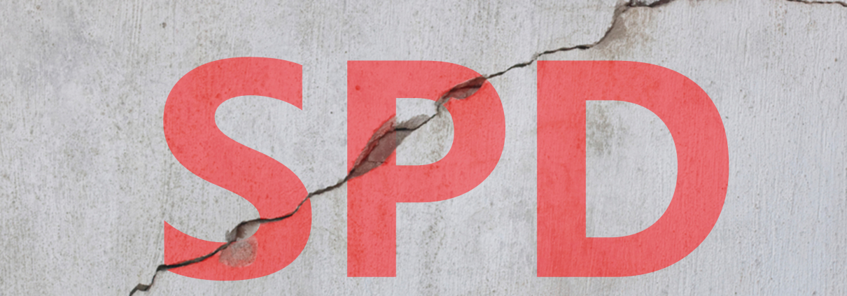 Eine Wand mit einem Riss durch das SPD Logo